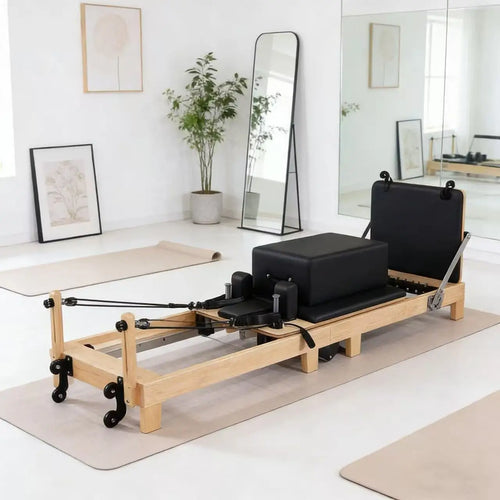 Reformer Pilates pliable en érable, sellerie noire
